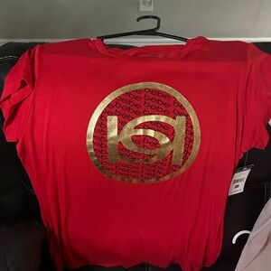 Bebe Vibrant Red Tee with Gold Emblem